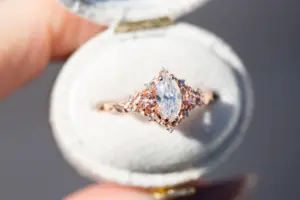 briar rose three stone with marquise moissanite and pink sapphire