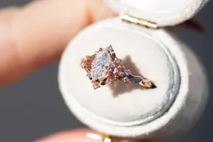 briar rose three stone with marquise moissanite and pink sapphire