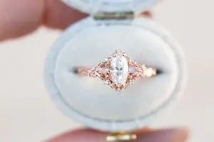 briar rose three stone with marquise moissanite and pink sapphire