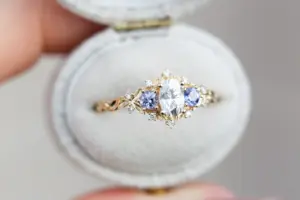 briar rose three stone with oval moissanite and round tanzanite (fairy queen ring)