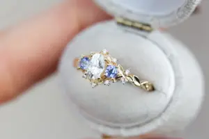 briar rose three stone with oval moissanite and round tanzanite (fairy queen ring)