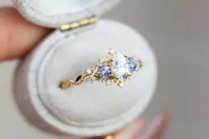 briar rose three stone with oval moissanite and round tanzanite (fairy queen ring)
