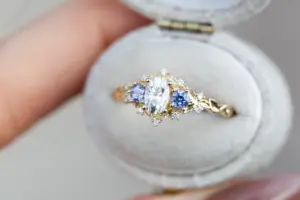 briar rose three stone with oval moissanite and round tanzanite (fairy queen ring)