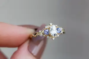 briar rose three stone with oval moissanite and round tanzanite (fairy queen ring)