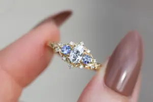 briar rose three stone with oval moissanite and round tanzanite (fairy queen ring)