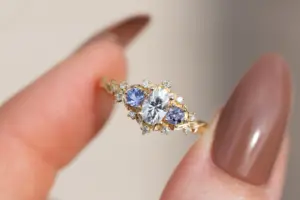 briar rose three stone with oval moissanite and round tanzanite (fairy queen ring)