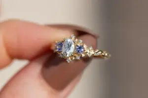 briar rose three stone with oval moissanite and round tanzanite (fairy queen ring)