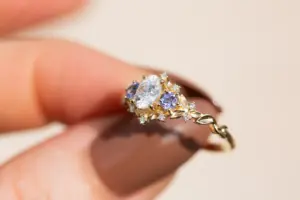 briar rose three stone with oval moissanite and round tanzanite (fairy queen ring)