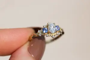 briar rose three stone with oval moissanite and round tanzanite (fairy queen ring)