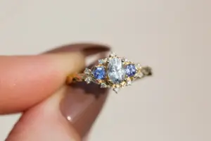 briar rose three stone with oval moissanite and round tanzanite (fairy queen ring)