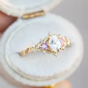 briar rose three stone with oval moissanite and pink sapphire (fairy queen ring)