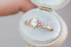 briar rose three stone with oval moissanite and pink sapphire (fairy queen ring)