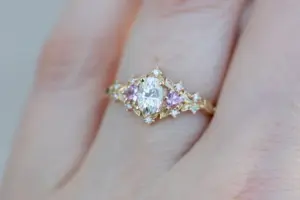 briar rose three stone with oval moissanite and pink sapphire (fairy queen ring)