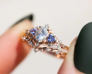 briar rose three stone with oval moissanite and tanzanite (fairy queen ring)