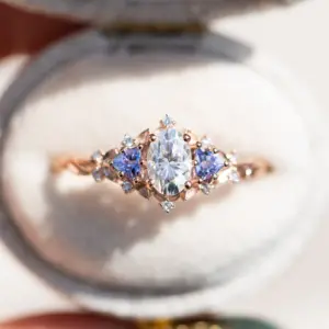 briar rose three stone with oval moissanite and tanzanite (fairy queen ring)
