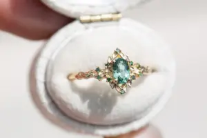 briar rose halo with oval lab light green sapphire
