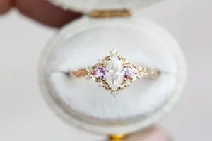 briar moon three stone with 8x5mm lab diamond pear center