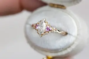 briar moon three stone with 8x5mm lab diamond pear center