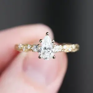 rowan three stone with 8x5mm pear lab diamond