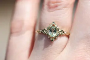 briar rose halo with oval lab light green sapphire