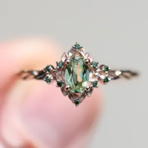 briar rose halo with oval lab light green sapphire