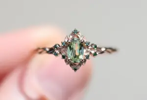 briar rose halo with oval lab light green sapphire