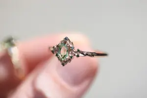 briar rose halo with oval lab light green sapphire