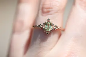 briar rose halo with oval lab light green sapphire