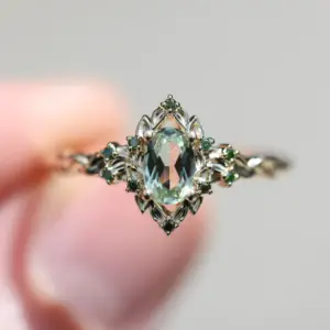 briar rose halo with oval lab light green sapphire