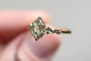 briar rose halo with oval lab light green sapphire