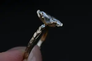 viridian with a 1.6ct marquise lab diamond