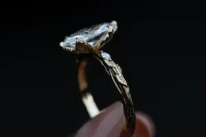 viridian with a 1.6ct marquise lab diamond