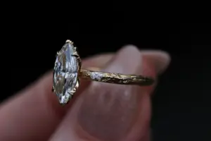 viridian with a 1.6ct marquise lab diamond