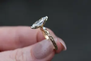 viridian with a 1.6ct marquise lab diamond