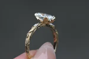 viridian with a 1.6ct marquise lab diamond