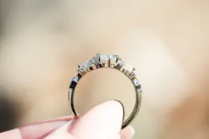 enchanted garden with .9ct marquise lab diamond and pear side stones