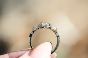 enchanted garden with .9ct marquise lab diamond and pear side stones