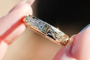 thorns band with baguette center stone