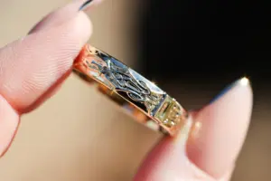 thorns band with baguette center stone
