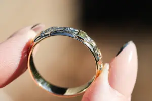 thorns band with baguette center stone