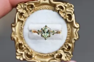 briar rose halo moon with 6x4mm oval lab green sapphire