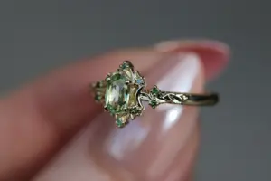 briar rose halo moon with 6x4mm oval lab green sapphire