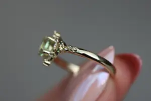 briar rose halo moon with 6x4mm oval lab green sapphire
