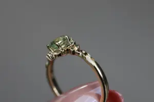 briar rose halo moon with 6x4mm oval lab green sapphire
