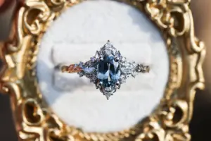 briar rose three stone with marquise accents and 7x5mm grey spinel