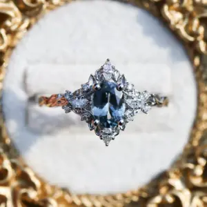 briar rose three stone with marquise accents and 7x5mm grey spinel