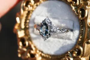 briar rose three stone with marquise accents and 7x5mm grey spinel