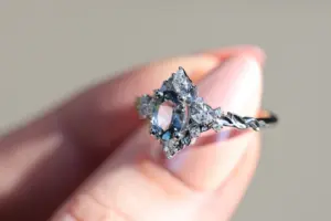 briar rose three stone with marquise accents and 7x5mm grey spinel