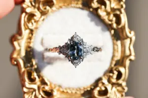 briar rose three stone with marquise accents and 7x5mm grey spinel
