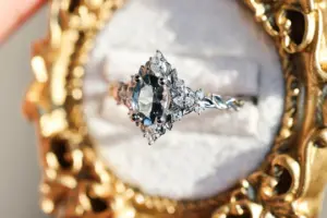 briar rose three stone with marquise accents and 7x5mm grey spinel